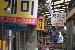 역사의 뒤안길로 사라지는 송현자유시장 [양키시장을 기록하다·(上)]